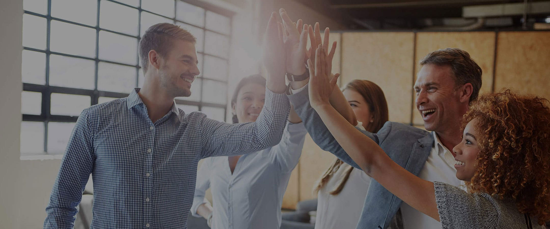 business collegues in a group huddle